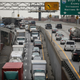 Heavy traffic moves along the Brooklyn-Queens Expressway, November 20, 2018 in the Brooklyn borough of New York City.